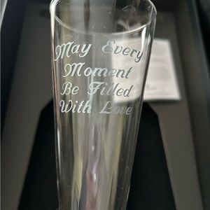 Waterford crystal flute with silver accents.